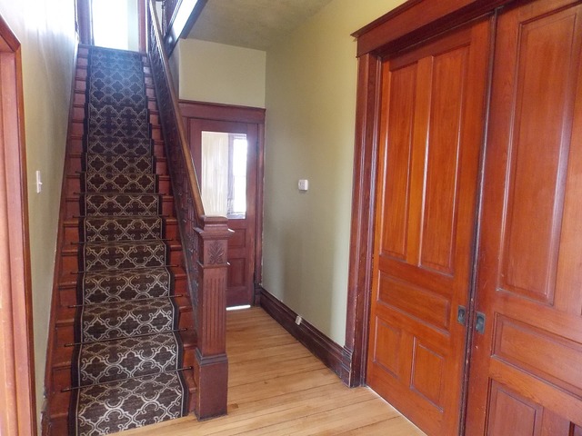 2265 North 3806th Road Serena, IL 60549 - Photo 3 of 19 a view of a hallway with wooden floor and windows