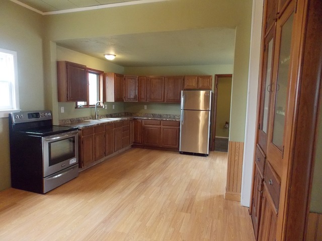 2265 North 3806th Road Serena, IL 60549 - Photo 7 of 19 a kitchen with stainless steel appliances granite countertop a refrigerator and a sink