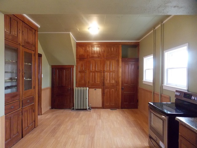 2265 North 3806th Road Serena, IL 60549 - Photo 8 of 19 a view of an empty room with a fireplace and a window