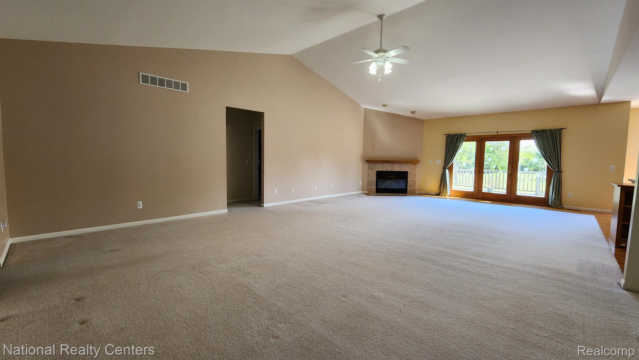 47745 Martz Road Belleville, MI 48111 - Photo 13 of 75 Huge great room with wood fireplace