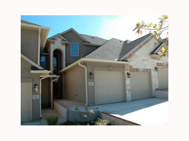 240 Sunrise Ridge Cove Austin, TX 78738 - Photo 1 of 1 a black and white photo of a house