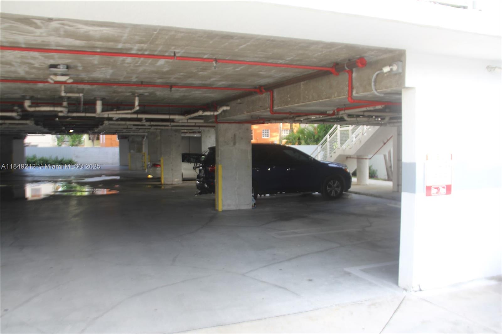 450 Southwest 3rd Street, Unit 10 Miami, FL 33130 - Photo 5 of 13 a view of parking