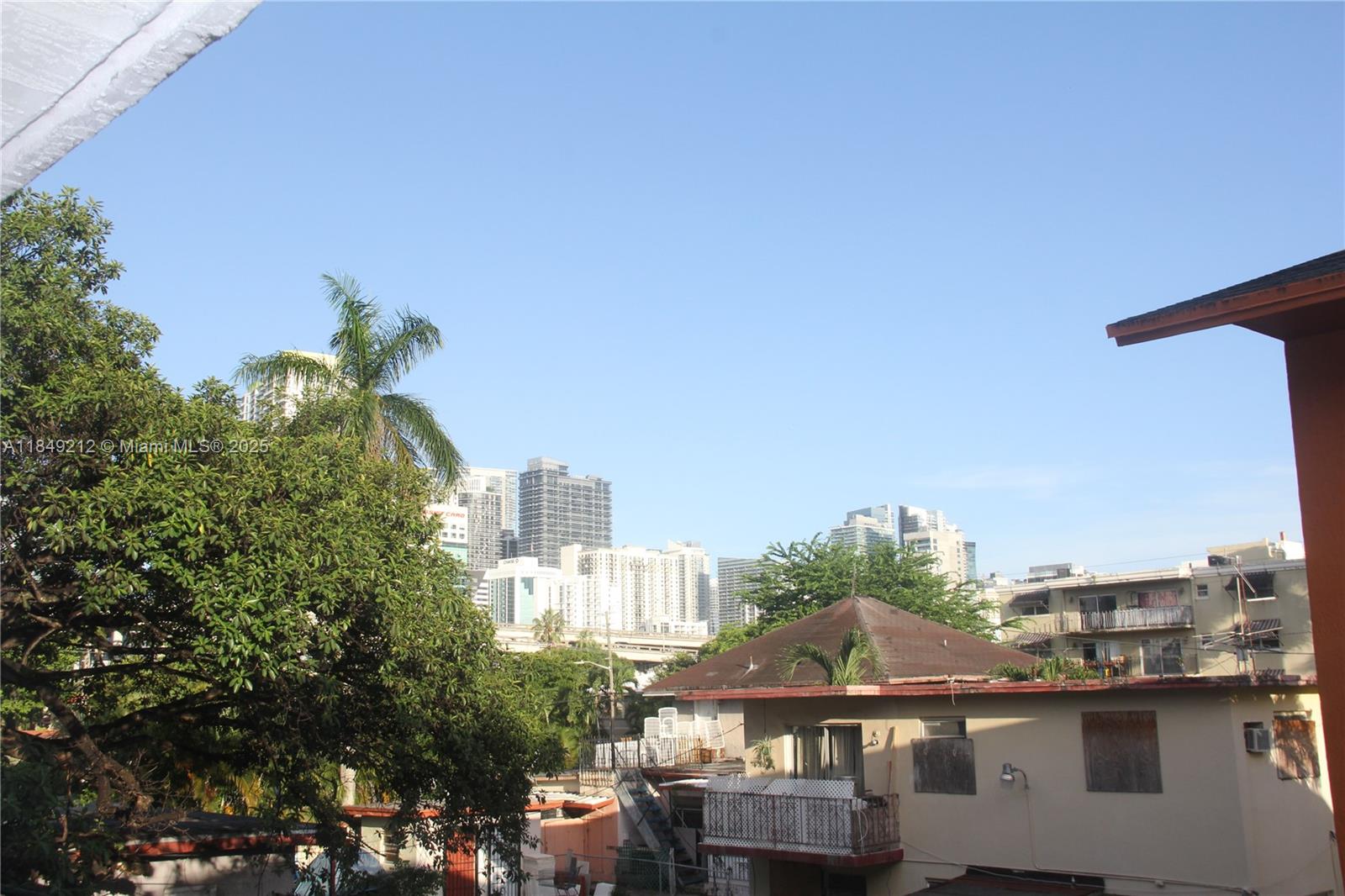 450 Southwest 3rd Street, Unit 10 Miami, FL 33130 - Photo 7 of 13 a city view with tall buildings