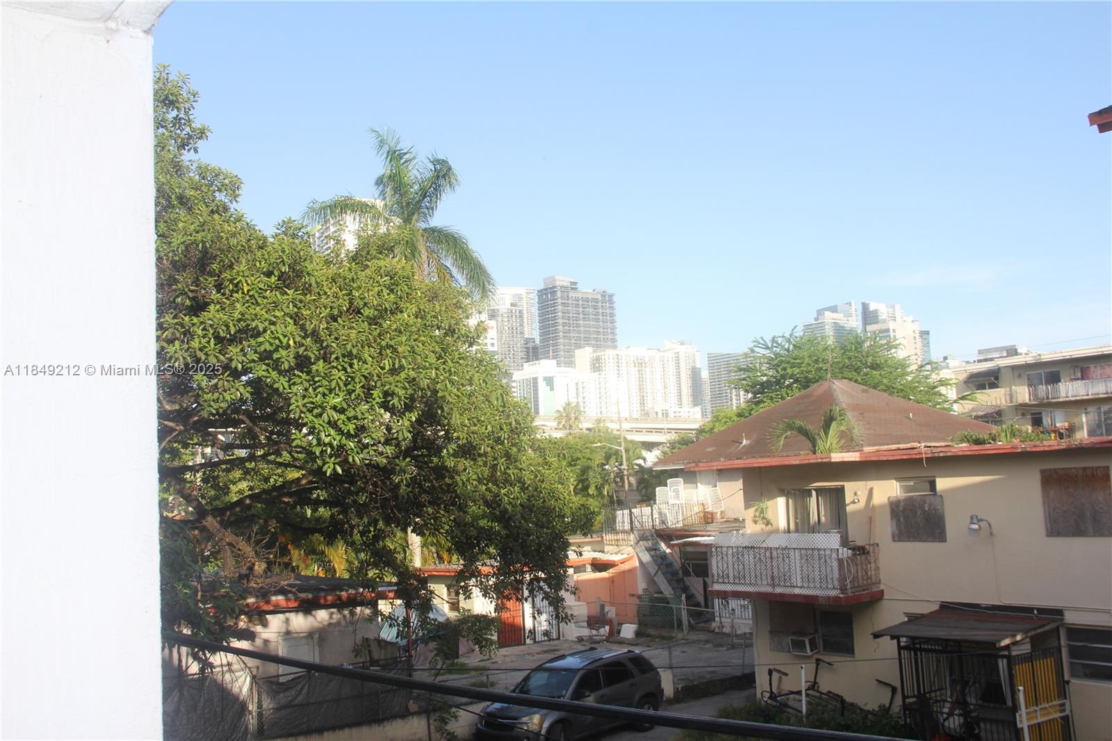 450 Southwest 3rd Street, Unit 10 Miami, FL 33130 - Photo 8 of 13 a view of a city that has tall buildings