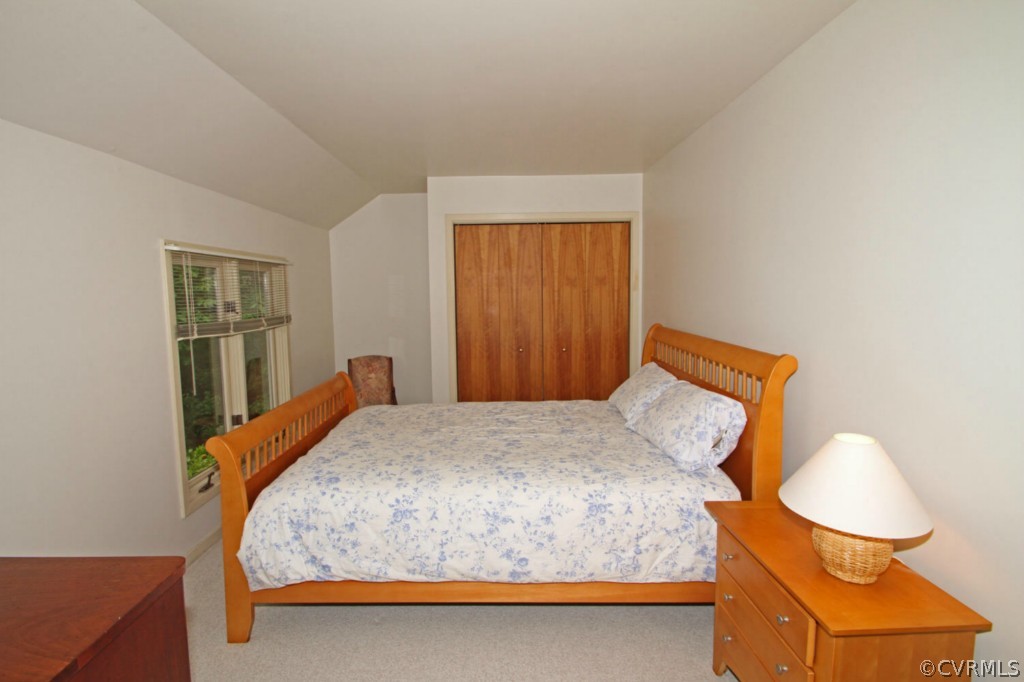 12211 Spring Run Road Chesterfield, VA 23832 - Photo 16 of 24 a bedroom with a bed and dresser