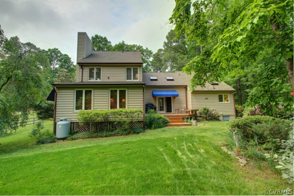 12211 Spring Run Road Chesterfield, VA 23832 - Photo 19 of 24 a front view of a house with a yard and trees