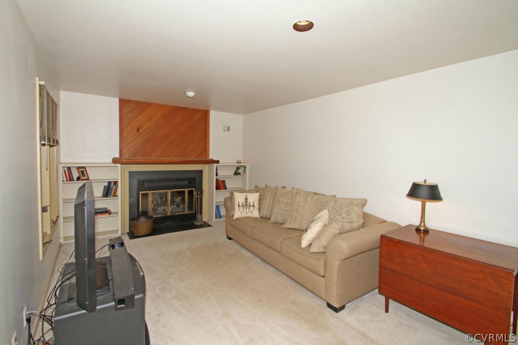 12211 Spring Run Road Chesterfield, VA 23832 - Photo 9 of 24 a living room with furniture and a fireplace