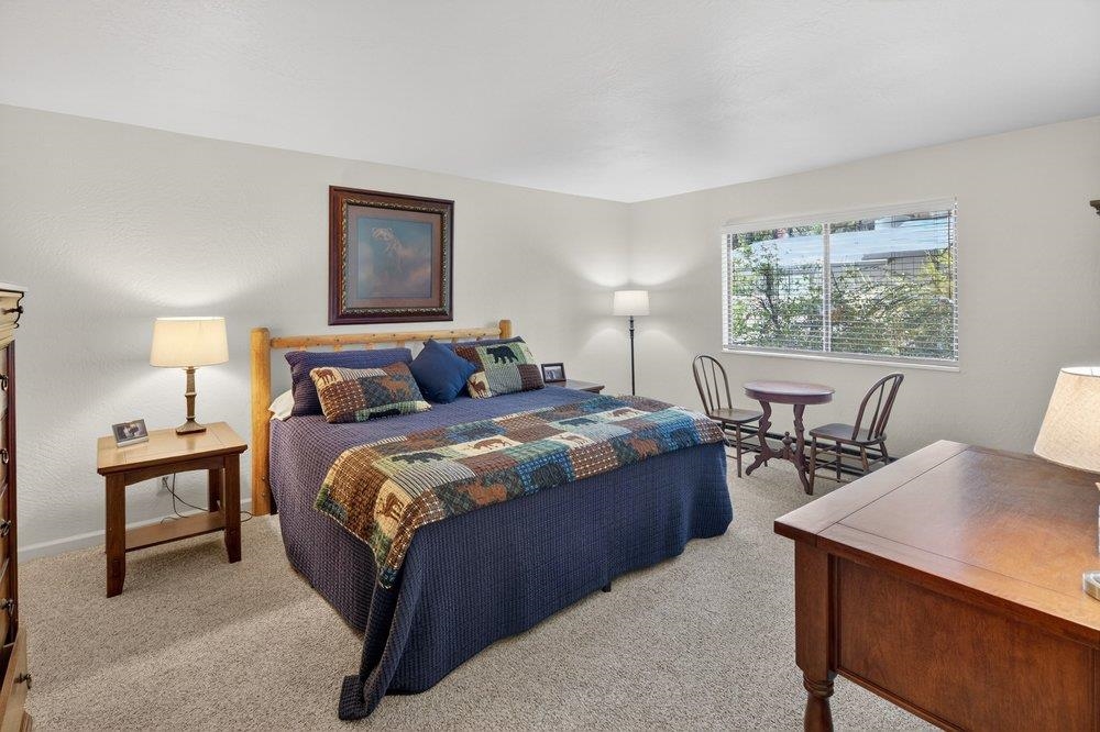 112 Poplar Valley Road Blairsden, CA 96103 - Photo 15 of 28 a bedroom with bed and window