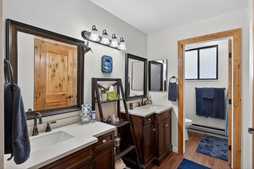 112 Poplar Valley Road Blairsden, CA 96103 - Photo 22 of 28 a bathroom with a sink a mirror and a shower