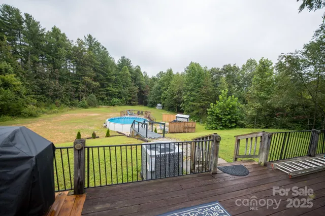 a view of a dining room with furniture and window