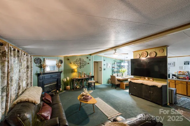 a kitchen with cabinets and chairs