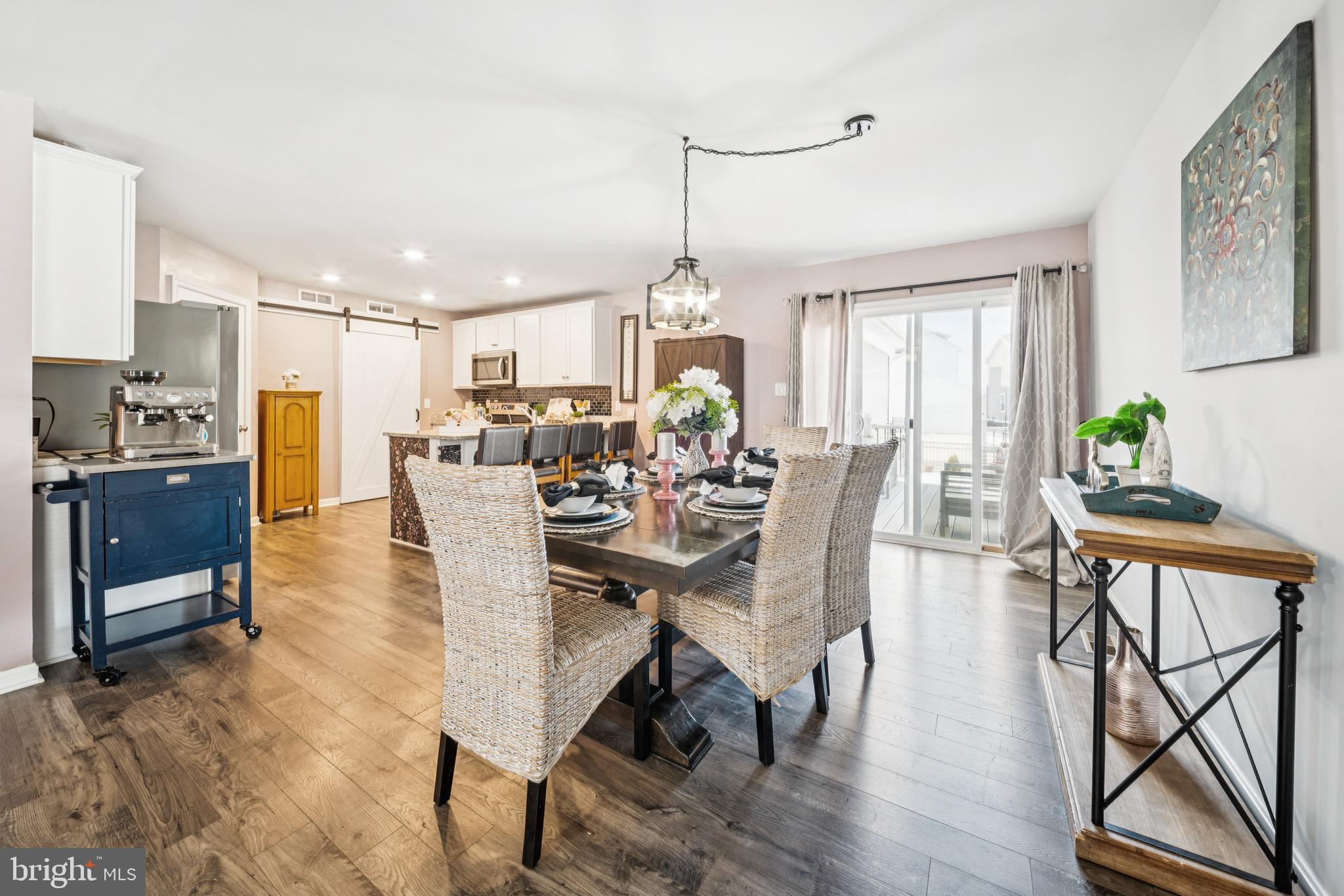 17912 Meriwether Lewis Street Ruther Glen, VA 22546 - Photo 12 of 44 a view of a dining room with furniture window and wooden floor