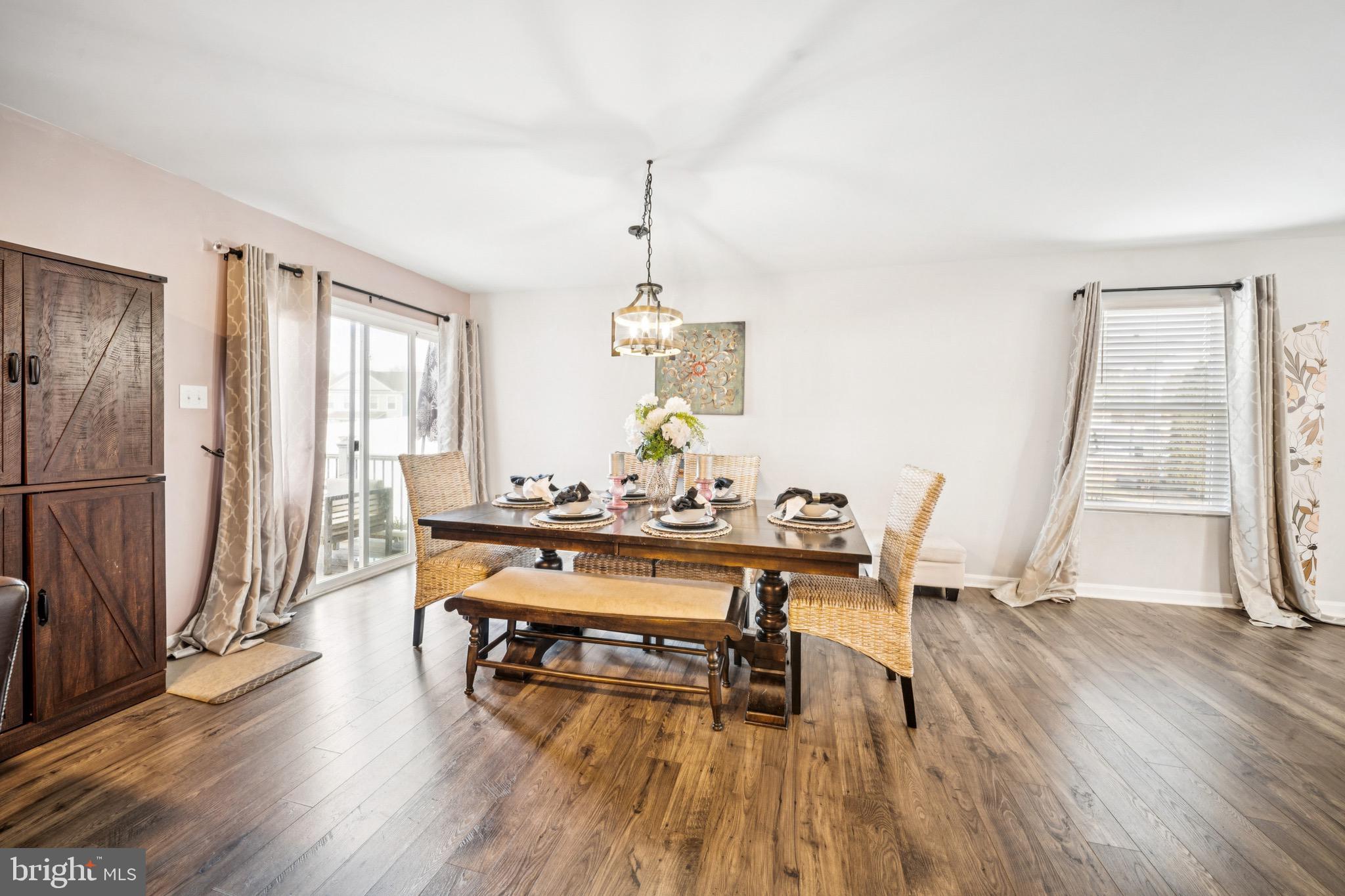 17912 Meriwether Lewis Street Ruther Glen, VA 22546 - Photo 13 of 44 a living room with furniture and a wooden floor