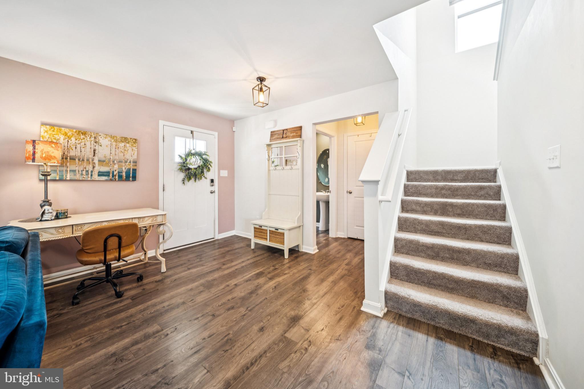 17912 Meriwether Lewis Street Ruther Glen, VA 22546 - Photo 19 of 44 a view of a workspace with wooden floor and windows