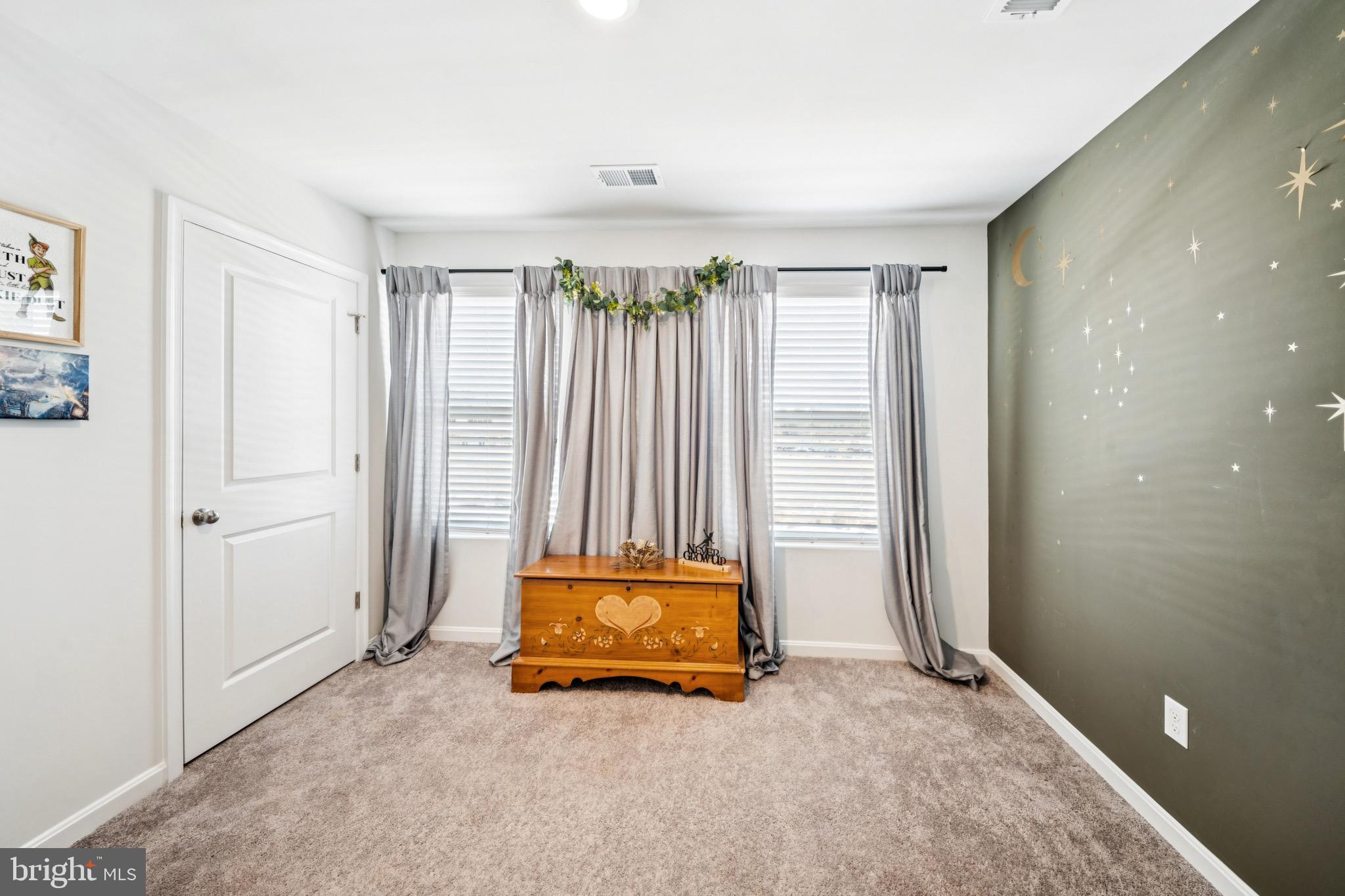 17912 Meriwether Lewis Street Ruther Glen, VA 22546 - Photo 30 of 44 wooden floor in an empty room with a window