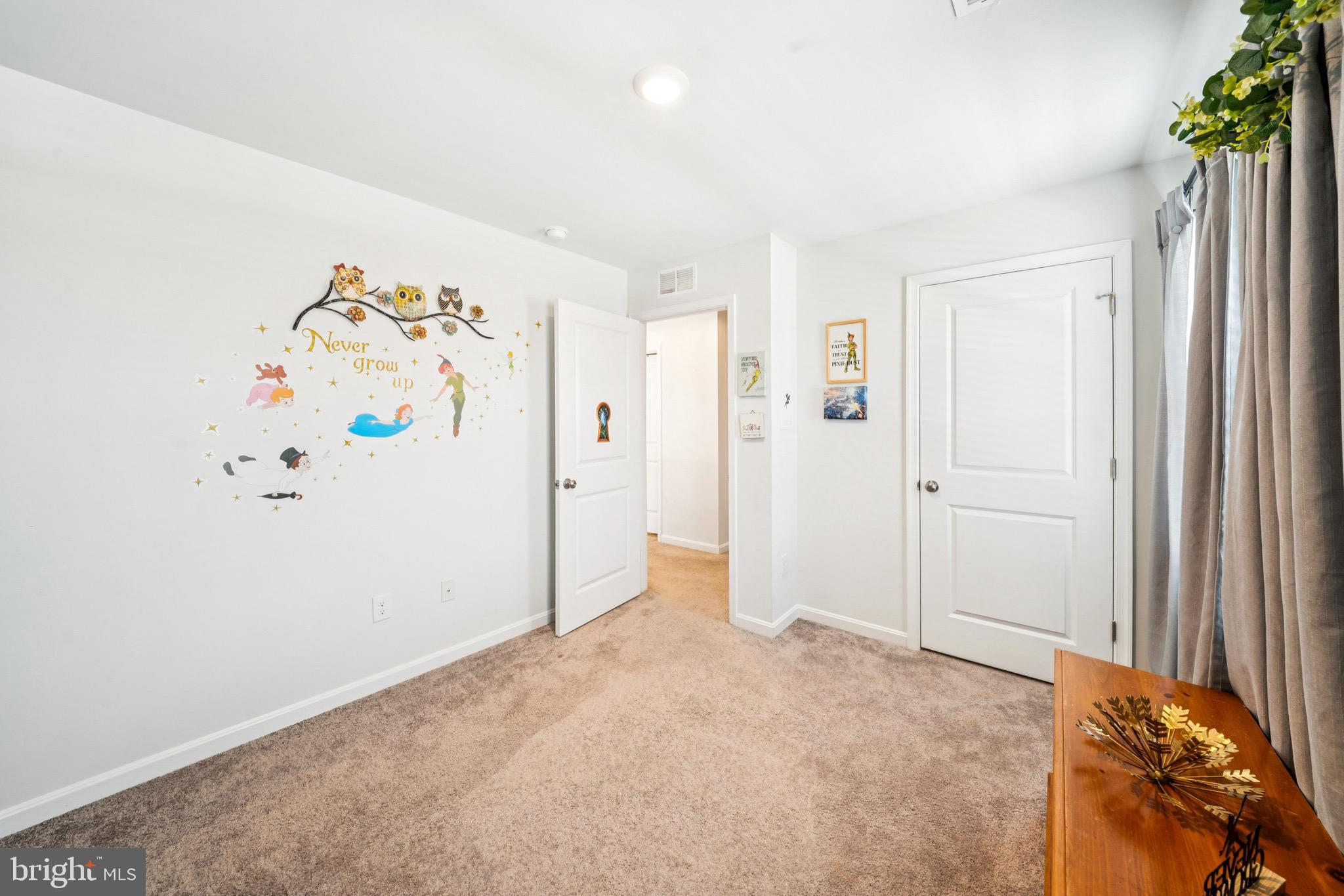 17912 Meriwether Lewis Street Ruther Glen, VA 22546 - Photo 31 of 44 a view of a livingroom with a refrigerator