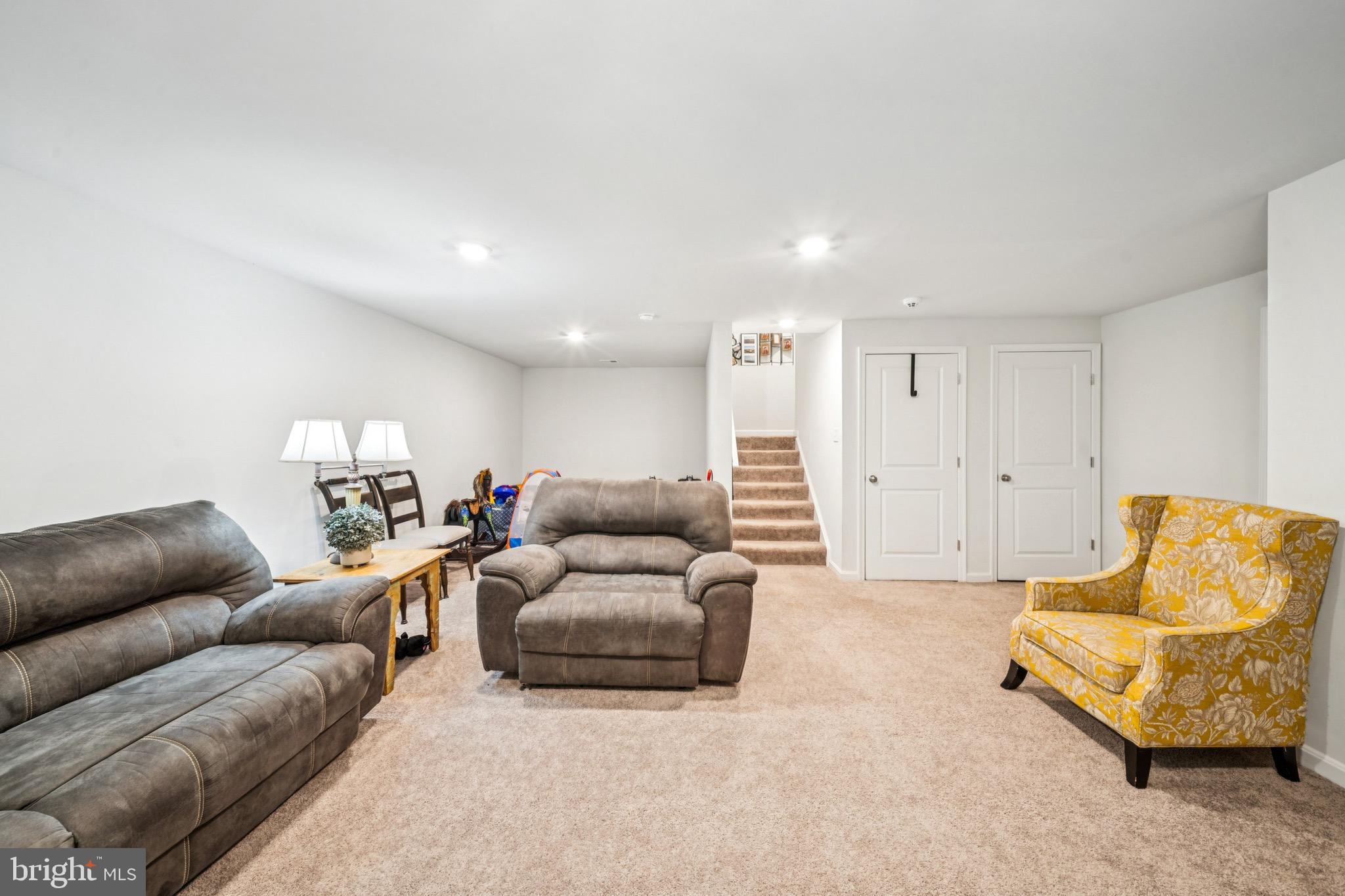 17912 Meriwether Lewis Street Ruther Glen, VA 22546 - Photo 35 of 44 a living room with furniture and a couch