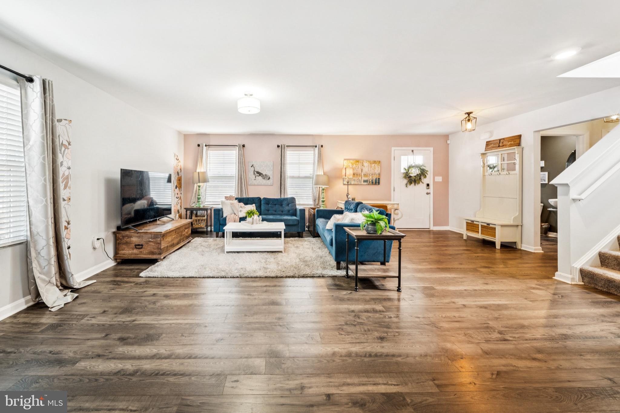 17912 Meriwether Lewis Street Ruther Glen, VA 22546 - Photo 8 of 44 a living room with furniture and a large window
