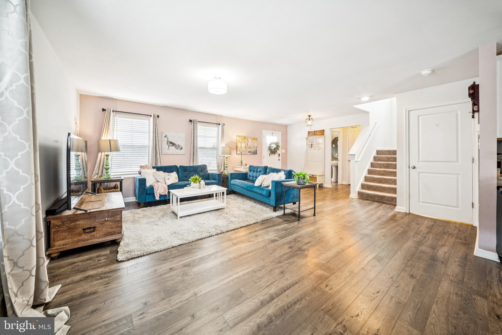 17912 Meriwether Lewis Street Ruther Glen, VA 22546 - Photo 9 of 44 a living room with furniture and a wooden floor