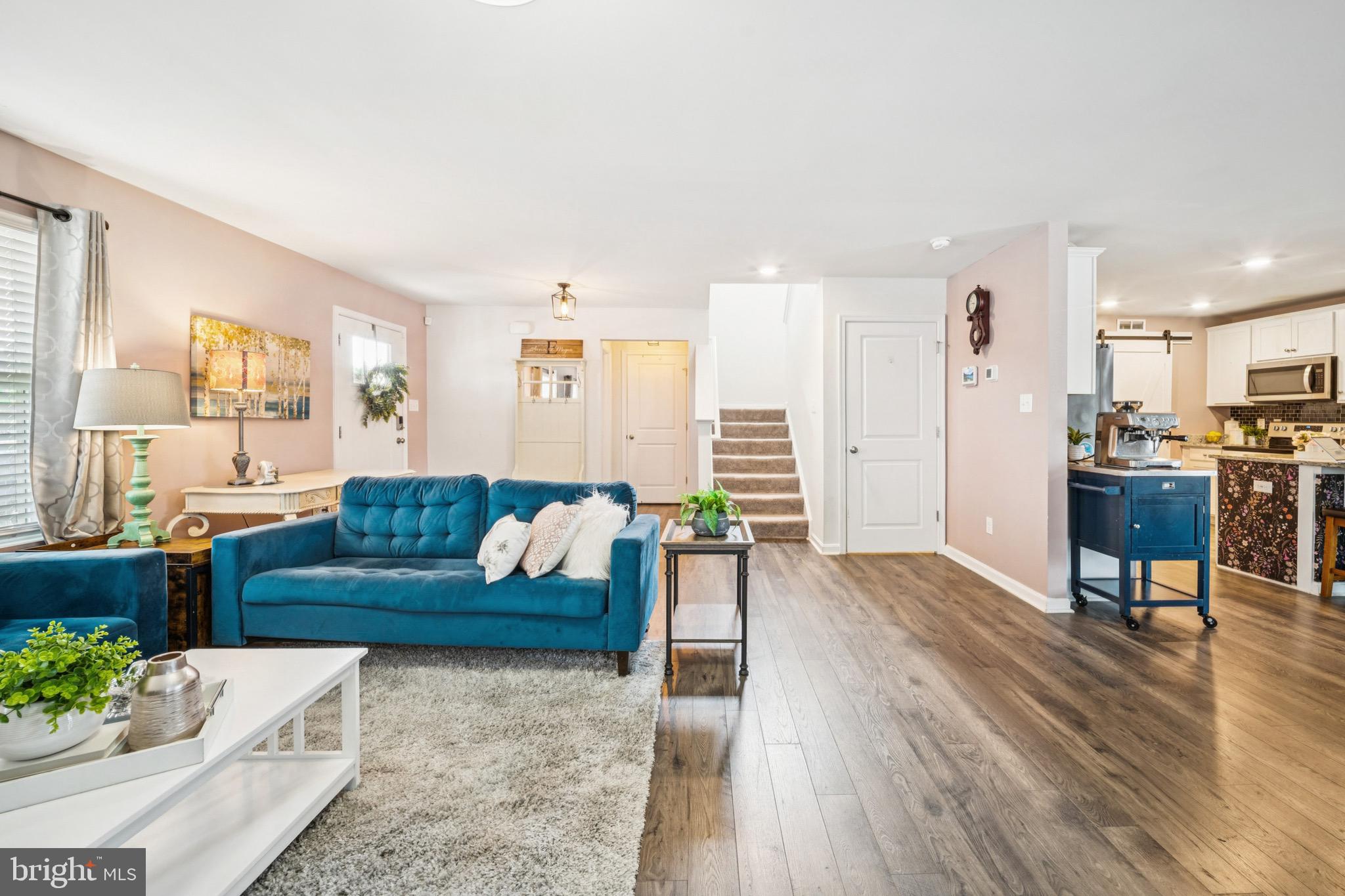 17912 Meriwether Lewis Street Ruther Glen, VA 22546 - Photo 10 of 44 a living room with furniture and kitchen view