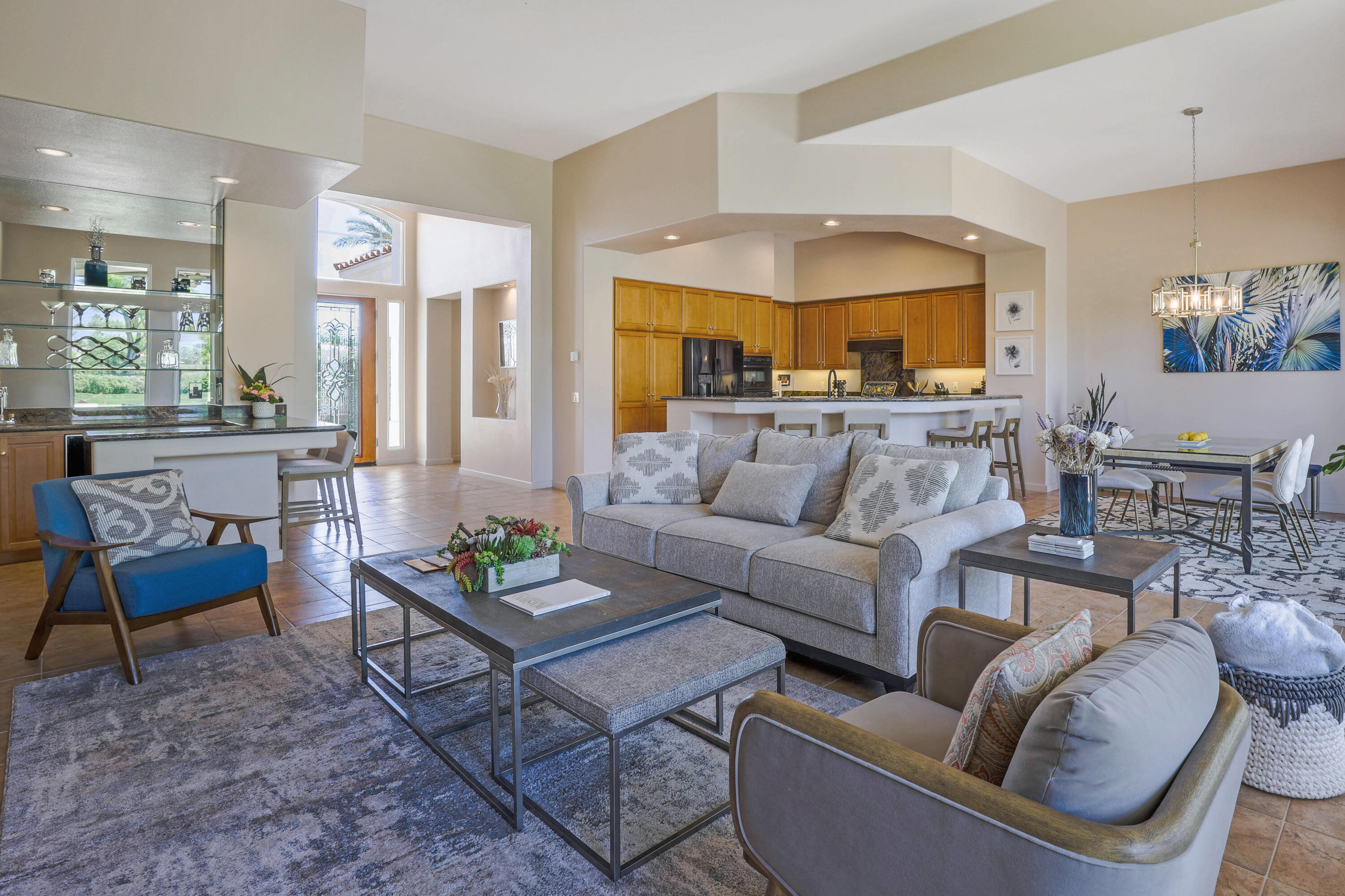 701 Indian Ridge Drive Palm Desert, CA 92211 - Photo 11 of 40 a living room with furniture and a large window