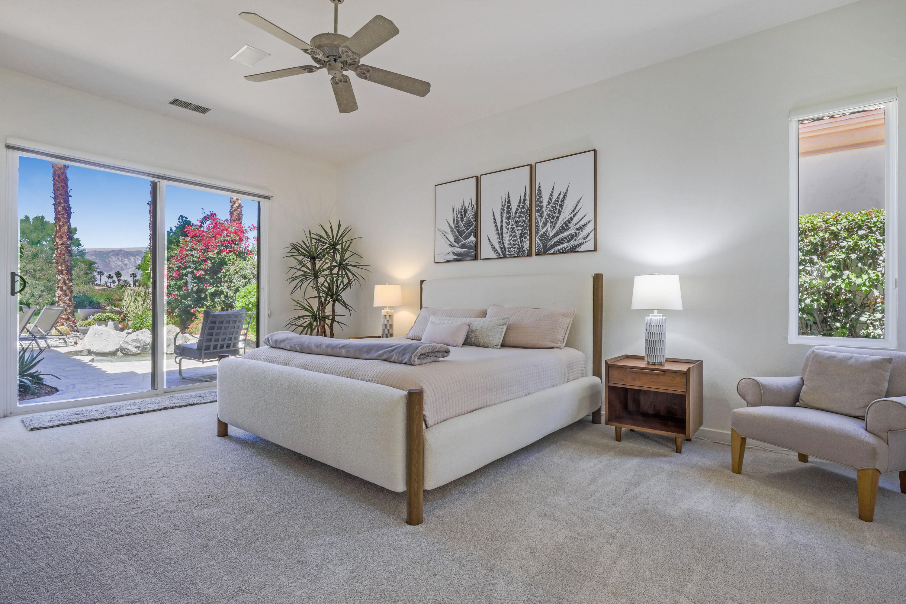 701 Indian Ridge Drive Palm Desert, CA 92211 - Photo 17 of 40 a living room with furniture and a large window