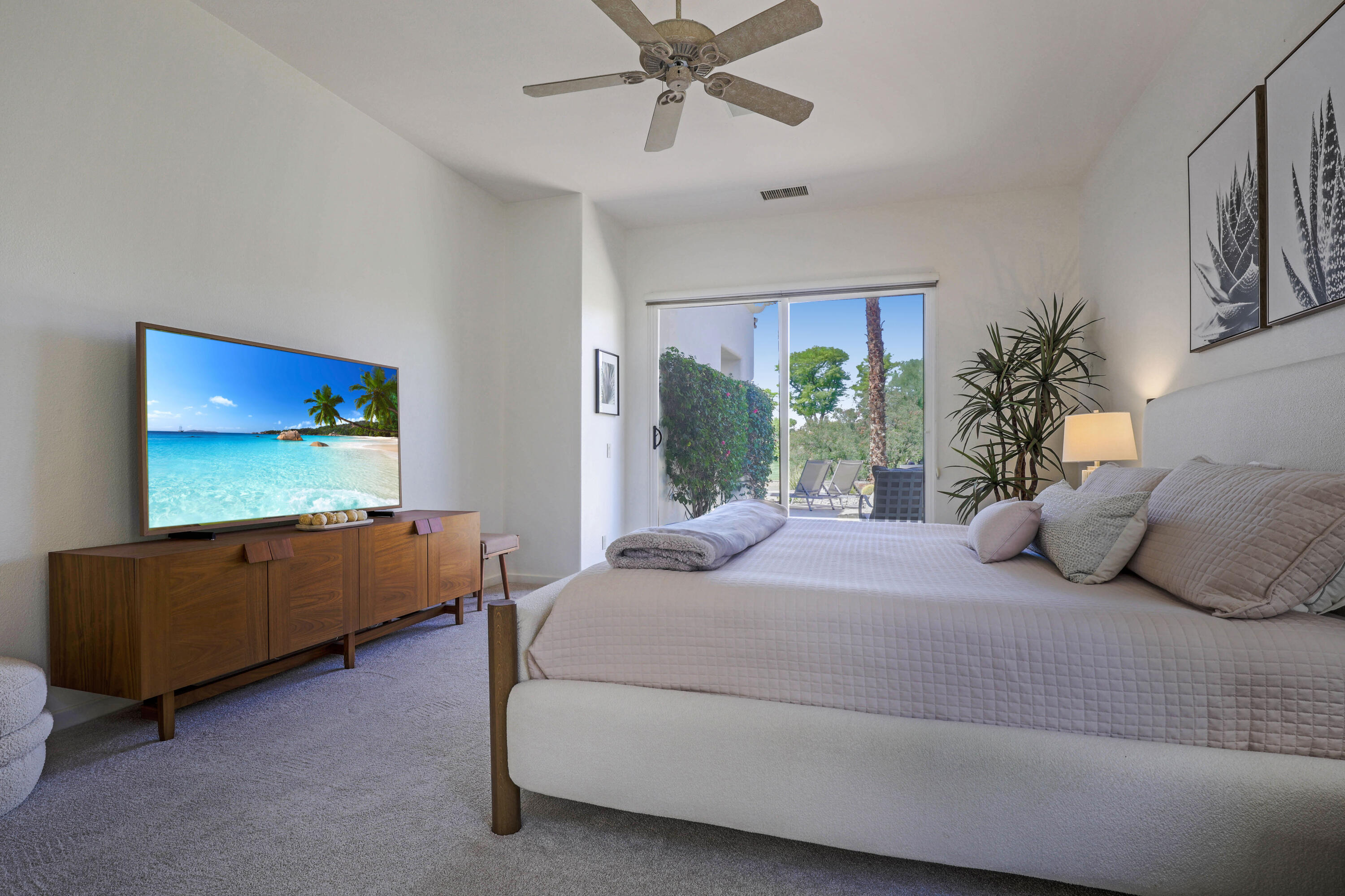 701 Indian Ridge Drive Palm Desert, CA 92211 - Photo 18 of 40 a bedroom with a bed and window