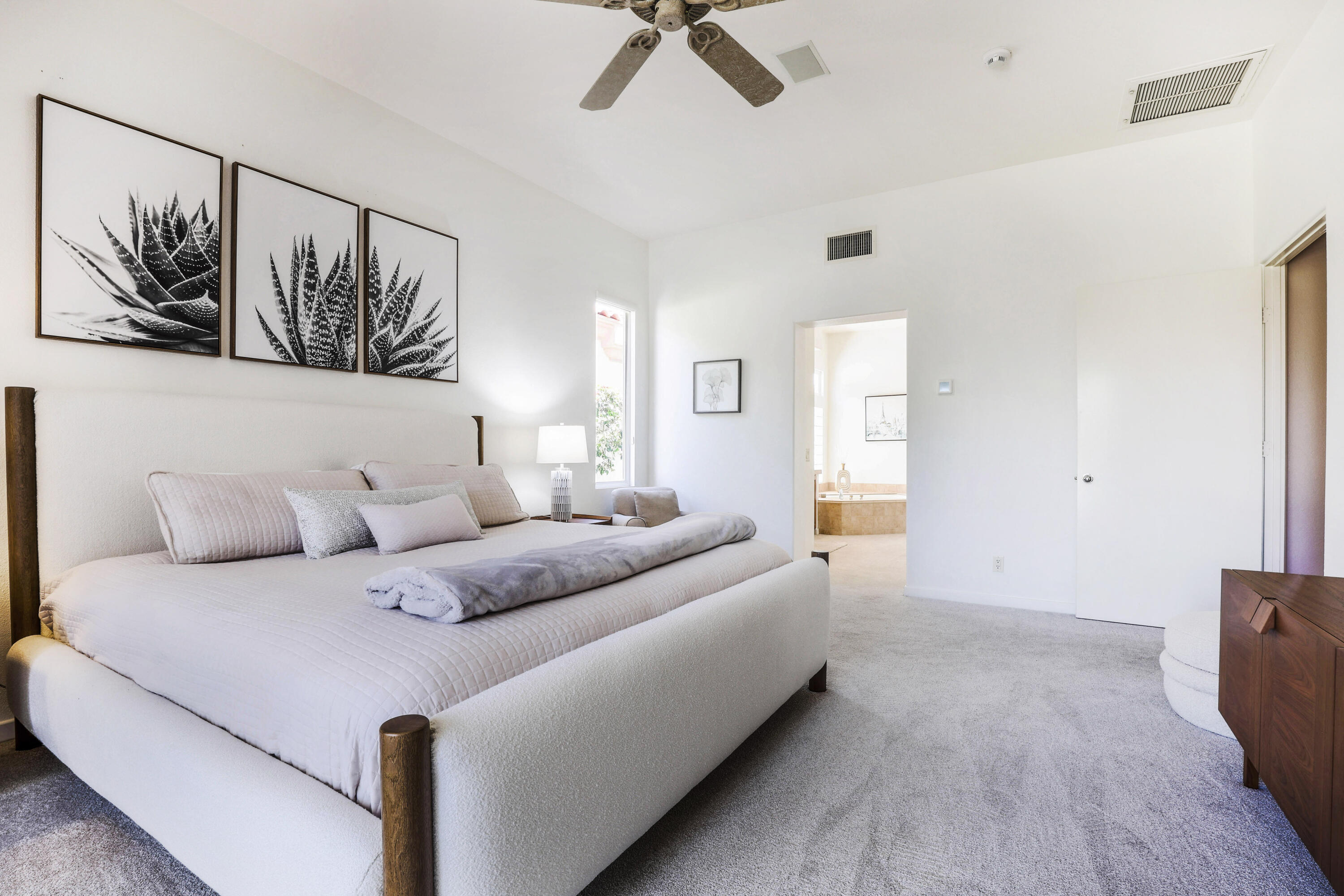 701 Indian Ridge Drive Palm Desert, CA 92211 - Photo 19 of 40 a living room with furniture and a ceiling fan