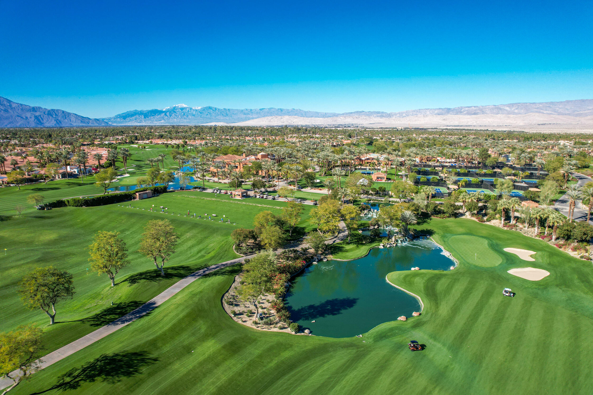 701 Indian Ridge Drive Palm Desert, CA 92211 - Photo 4 of 40 a view of a city with mountains in the background