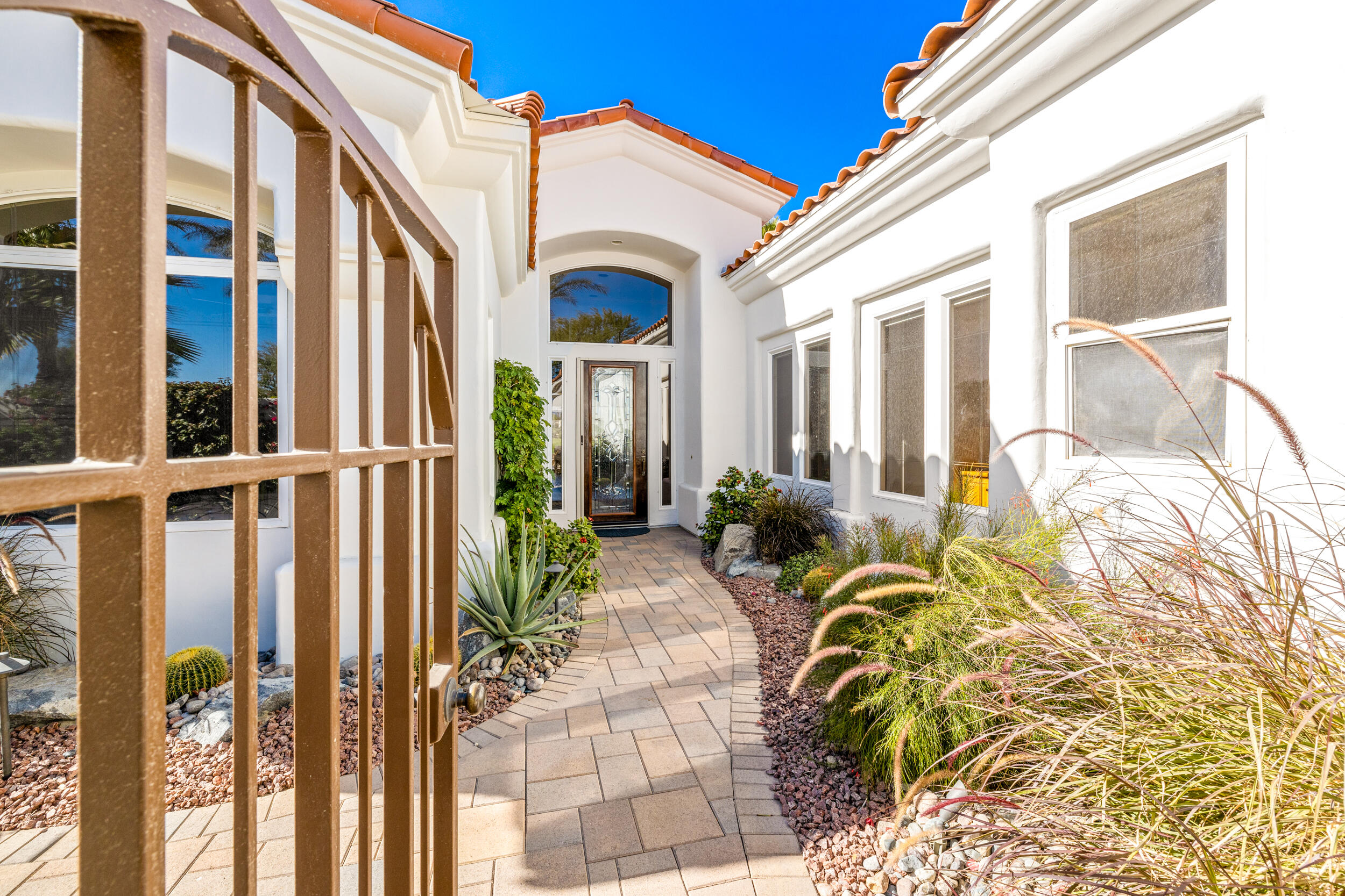 701 Indian Ridge Drive Palm Desert, CA 92211 - Photo 7 of 40 a house view with a outdoor space