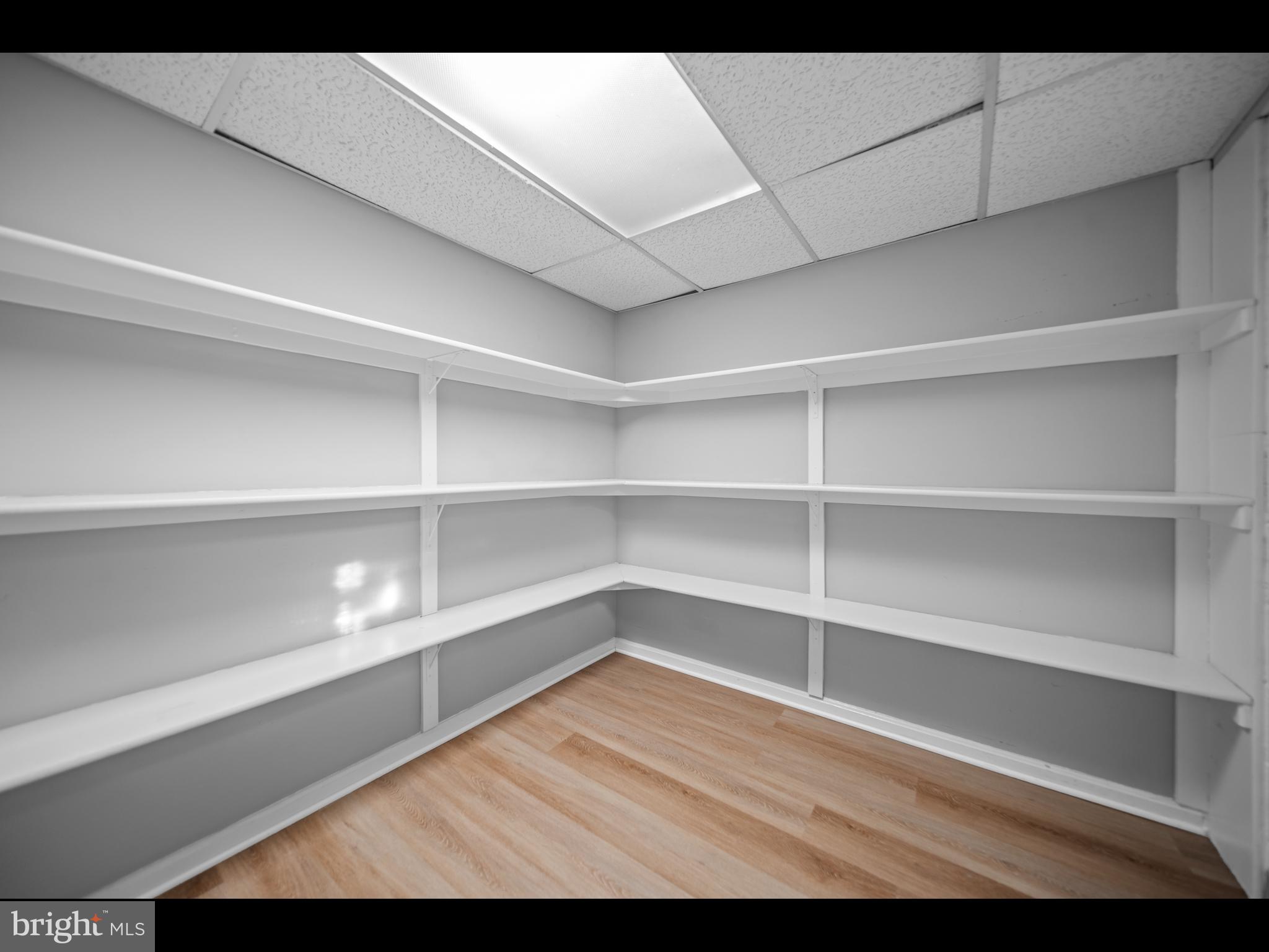 1609 Dunterry Place McLean, VA 22101 - Photo 13 of 36 a view of a room with shelf