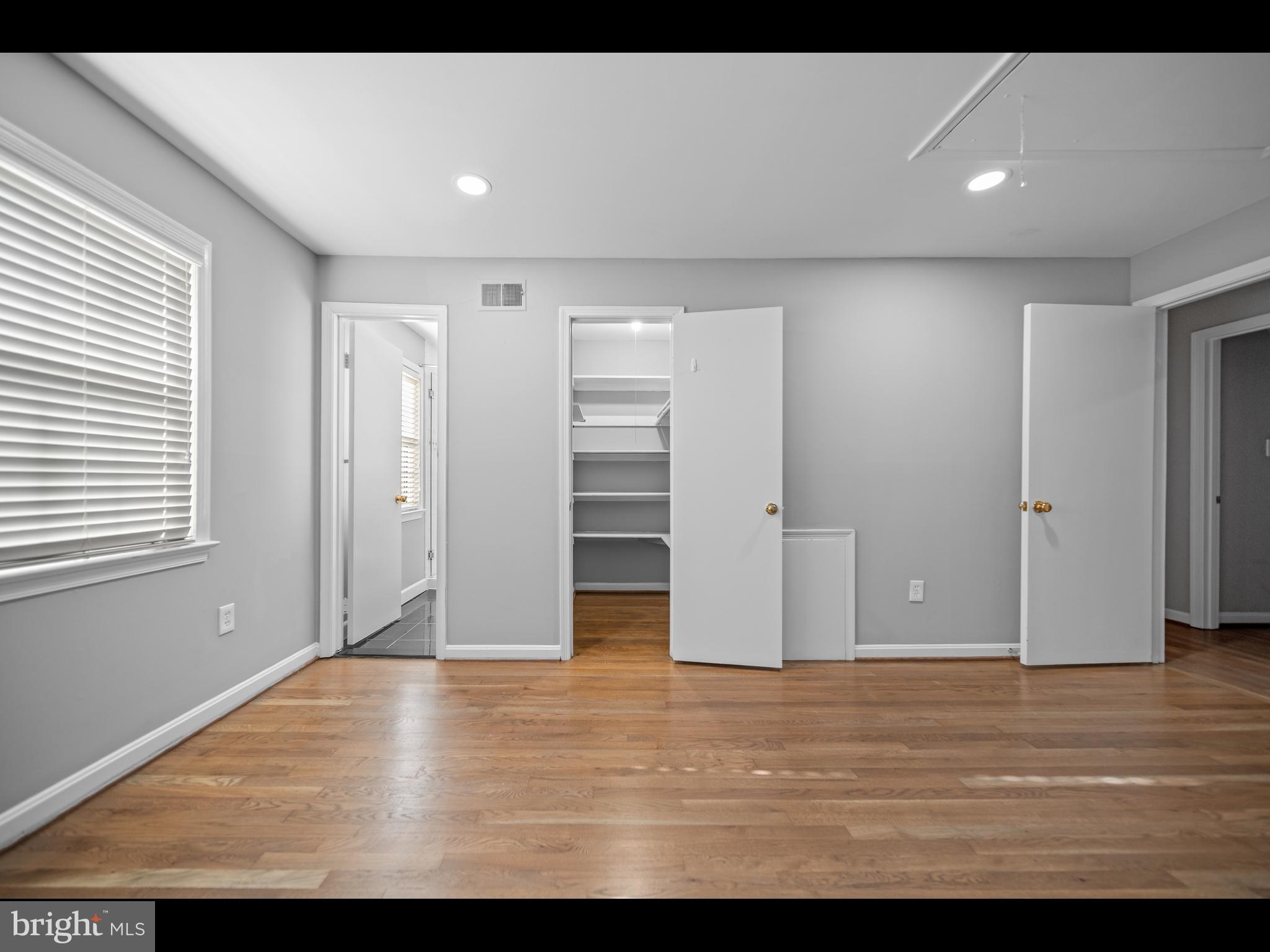 1609 Dunterry Place McLean, VA 22101 - Photo 23 of 36 a view of empty room with wooden floor