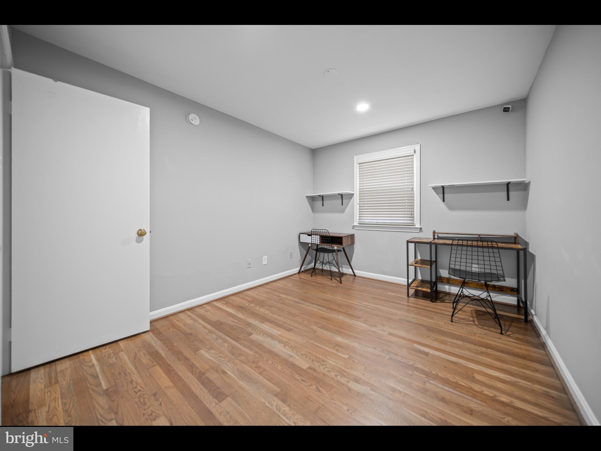 1609 Dunterry Place McLean, VA 22101 - Photo 25 of 36 a view of a livingroom with furniture and a workspace