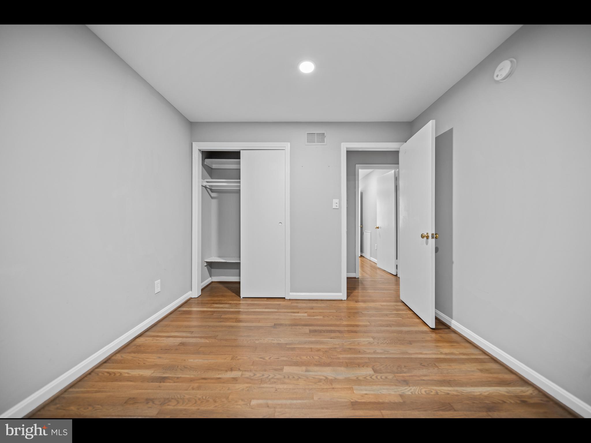 1609 Dunterry Place McLean, VA 22101 - Photo 26 of 36 a view of an empty room with wooden floor