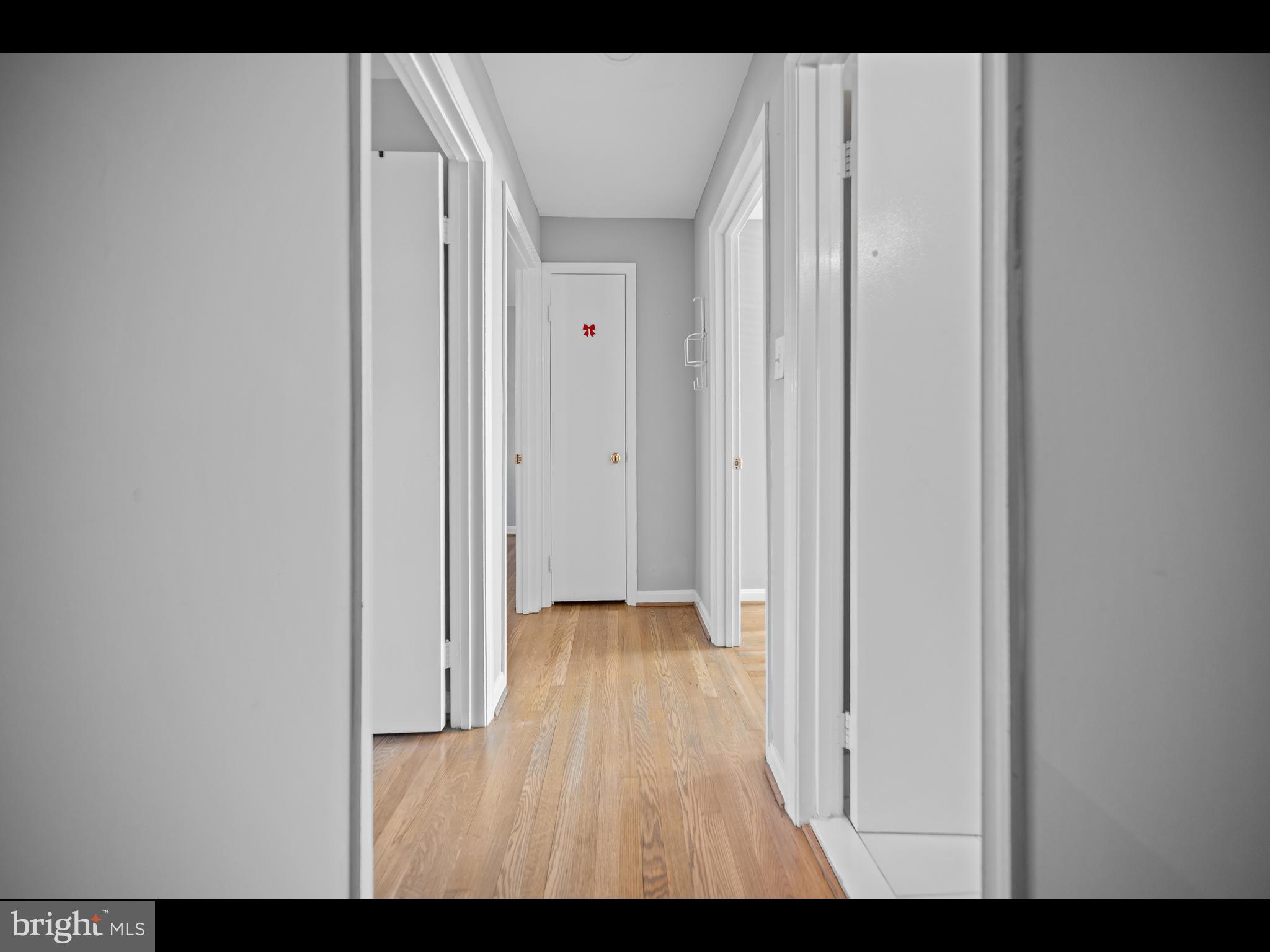 1609 Dunterry Place McLean, VA 22101 - Photo 34 of 36 a view of a hallway with wooden floor