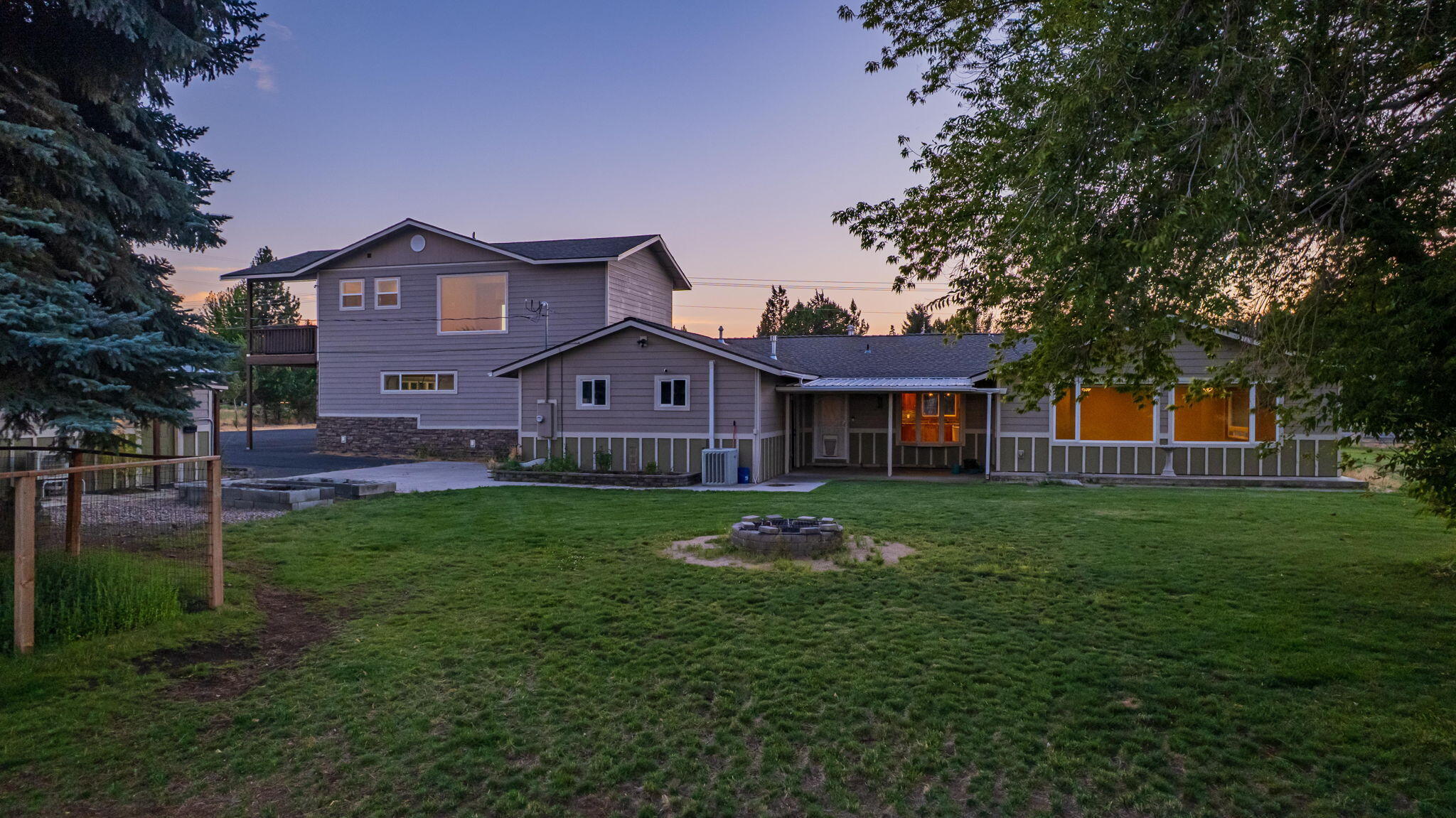 62466 Eagle Road Bend, OR 97701 - Photo 88 of 93 a front view of a house with a yard