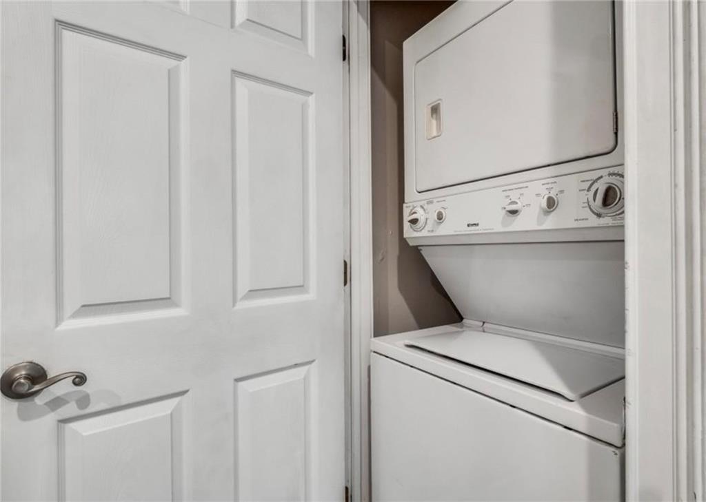 2846 Piedmont Road Northeast, Unit 1 Atlanta, GA 30305 - Photo 16 of 29 a utility room with dryer and washer