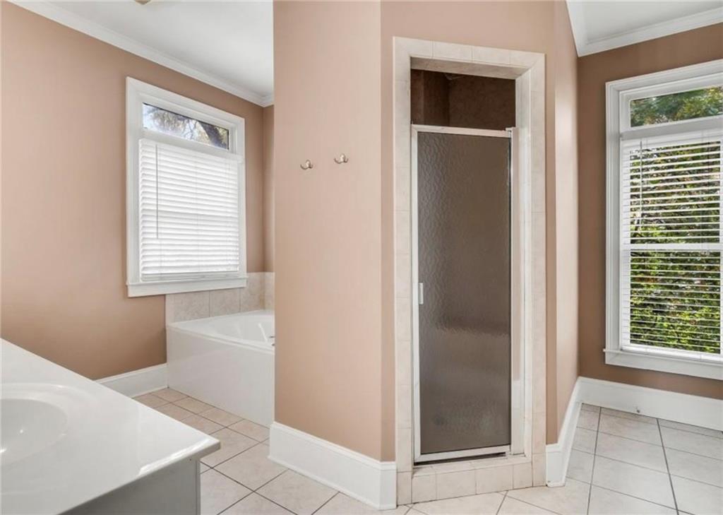 2846 Piedmont Road Northeast, Unit 1 Atlanta, GA 30305 - Photo 19 of 29 a view of an empty room and a window