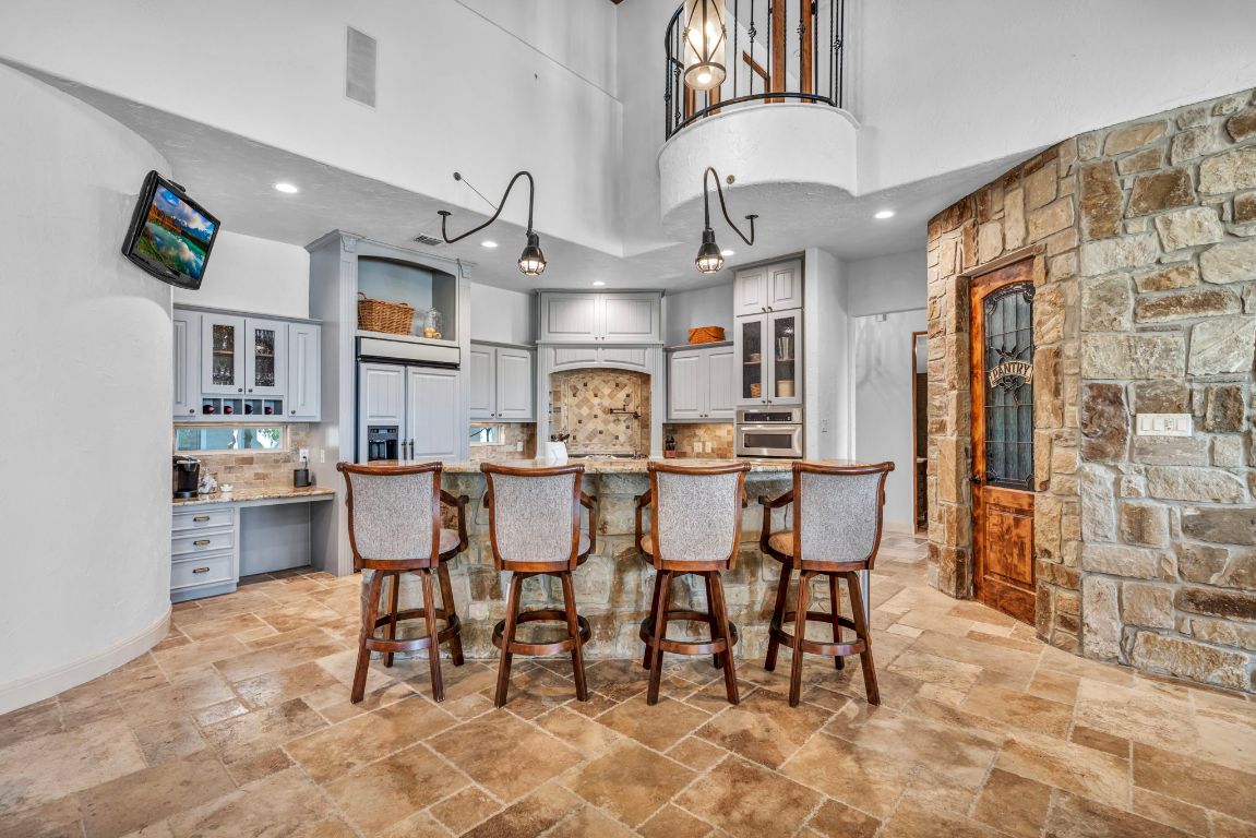 144 Serene Street Spring Branch, TX 78070 - Photo 11 of 37 a view of a dining room with furniture
