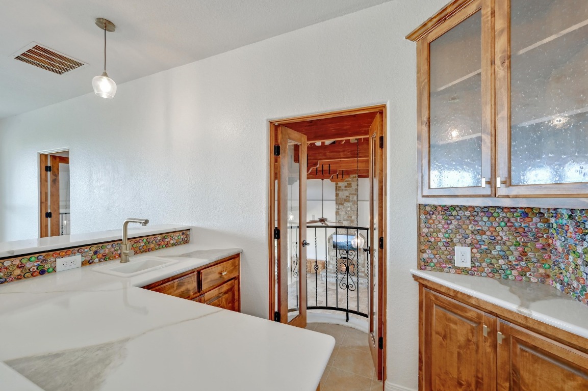 144 Serene Street Spring Branch, TX 78070 - Photo 20 of 37 a hallway with a large window and front door