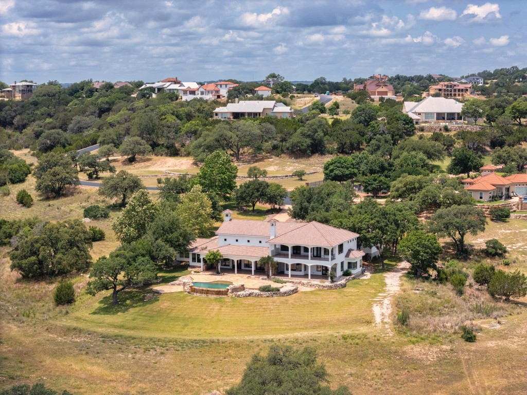 144 Serene Street Spring Branch, TX 78070 - Photo 36 of 37 a view of a house with a yard and lake view