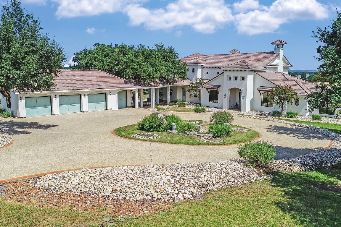 144 Serene Street Spring Branch, TX 78070 - Photo 7 of 37 a front view of a house with a yard