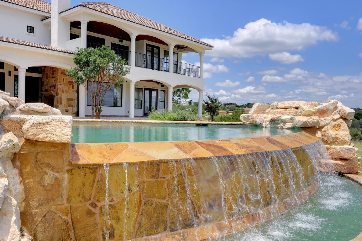 144 Serene Street Spring Branch, TX 78070 - Photo 9 of 37 a front view of a house with a yard