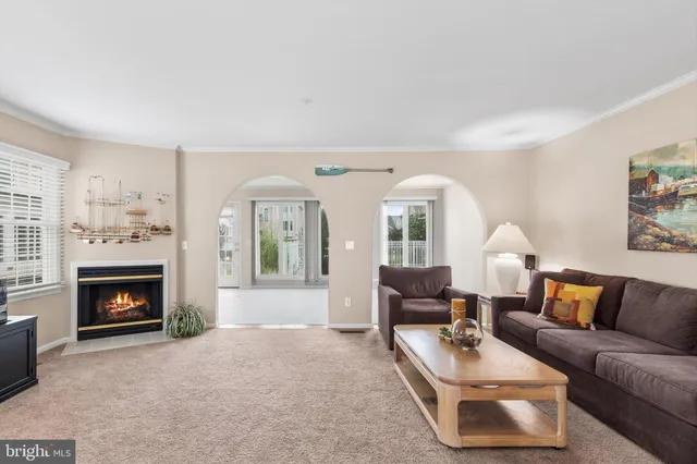 a dining hall with dining table and chairs