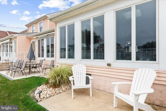 a work room with furniture and windows