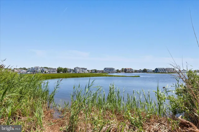 a view of a balcony with an ocean view