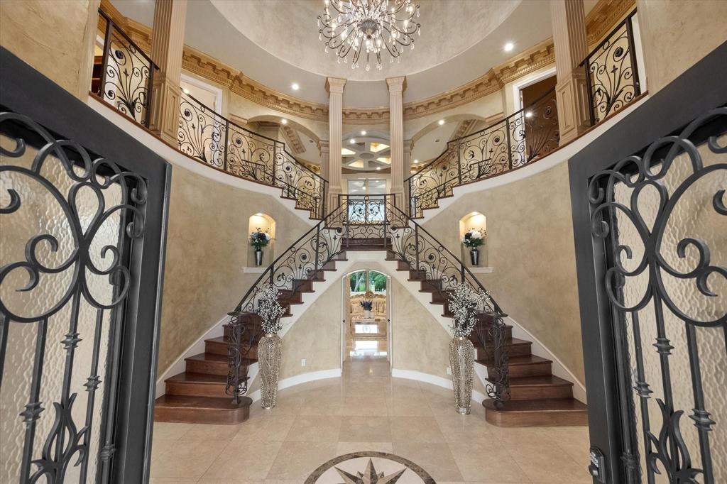 2314 Sunset Ridge Circle Cedar Hill, TX 75104 - Photo 3 of 40 Dual staircases make for a grand entrance into this home