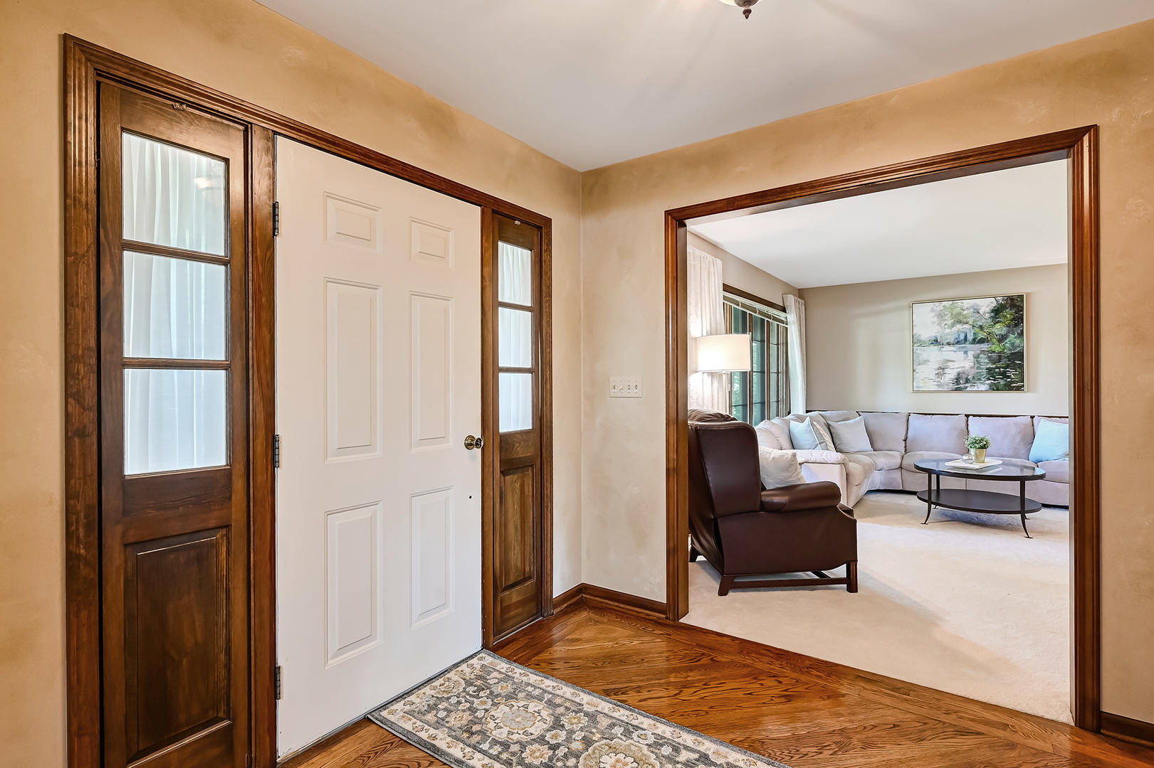8141 Ridgepoint Drive Burr Ridge, IL 60527 - Photo 3 of 46 a living room with furniture and a window