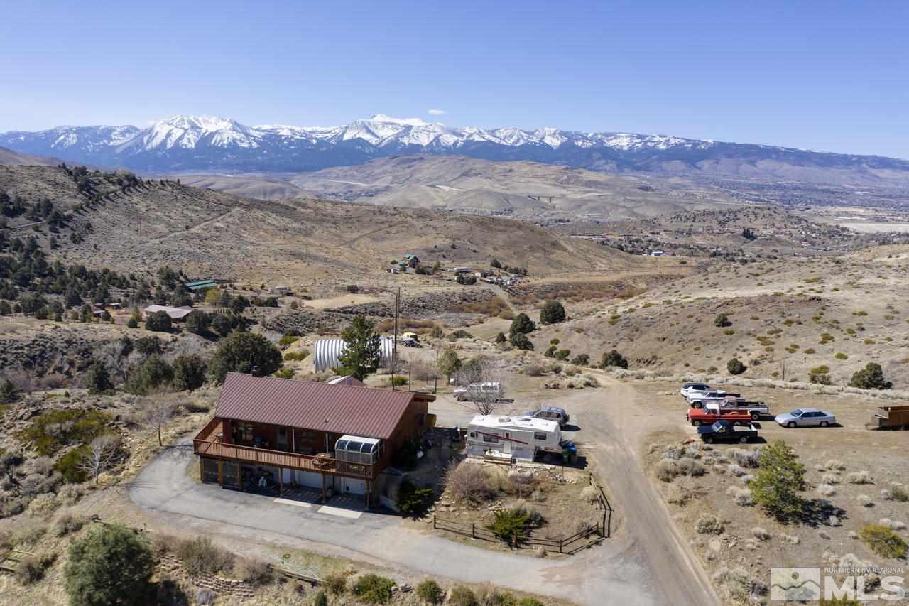 16500 Toll Road Reno, NV 89521 - Photo 1 of 25 an aerial view of a house with a mountain