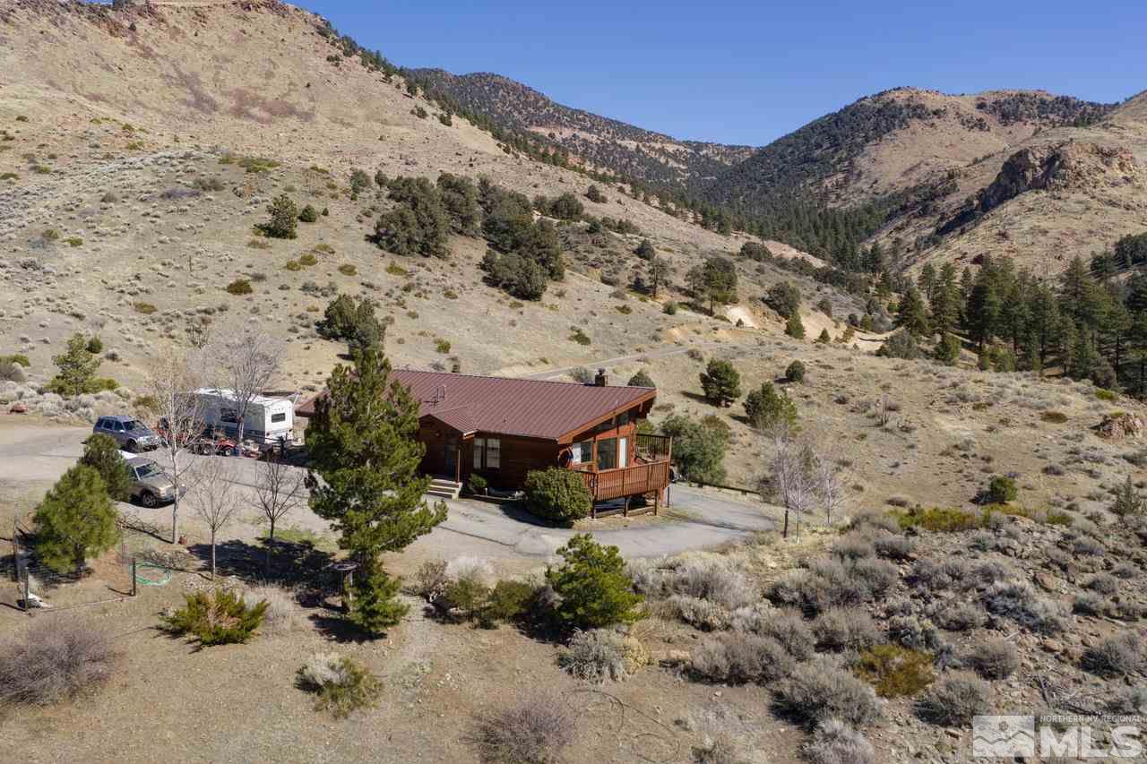 16500 Toll Road Reno, NV 89521 - Photo 22 of 25 a view of a house with a mountain